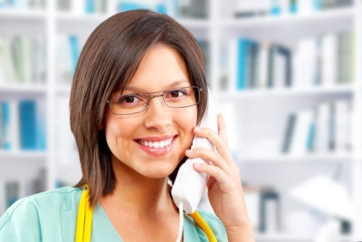 nurse using telephone